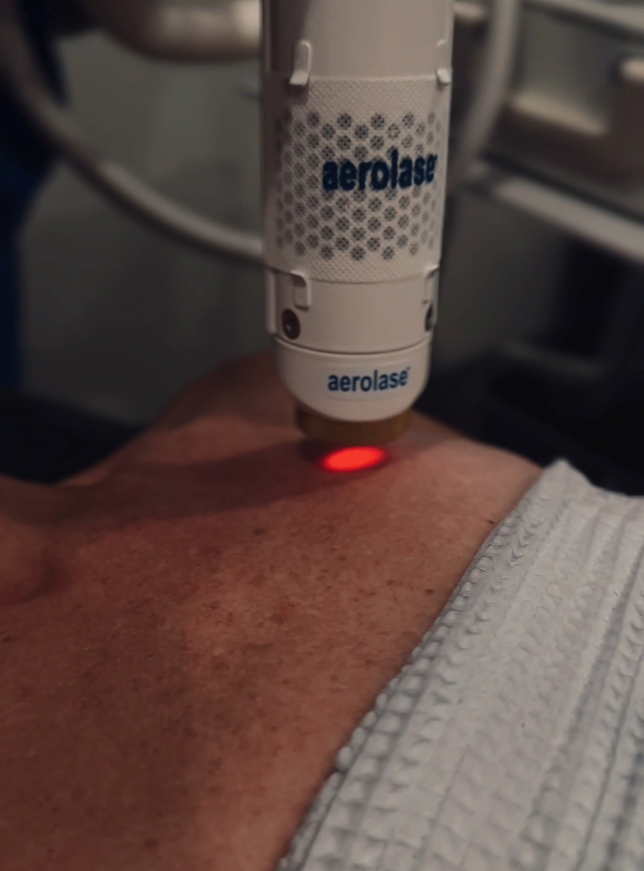Aerolase Neo Elite handpiece in use
